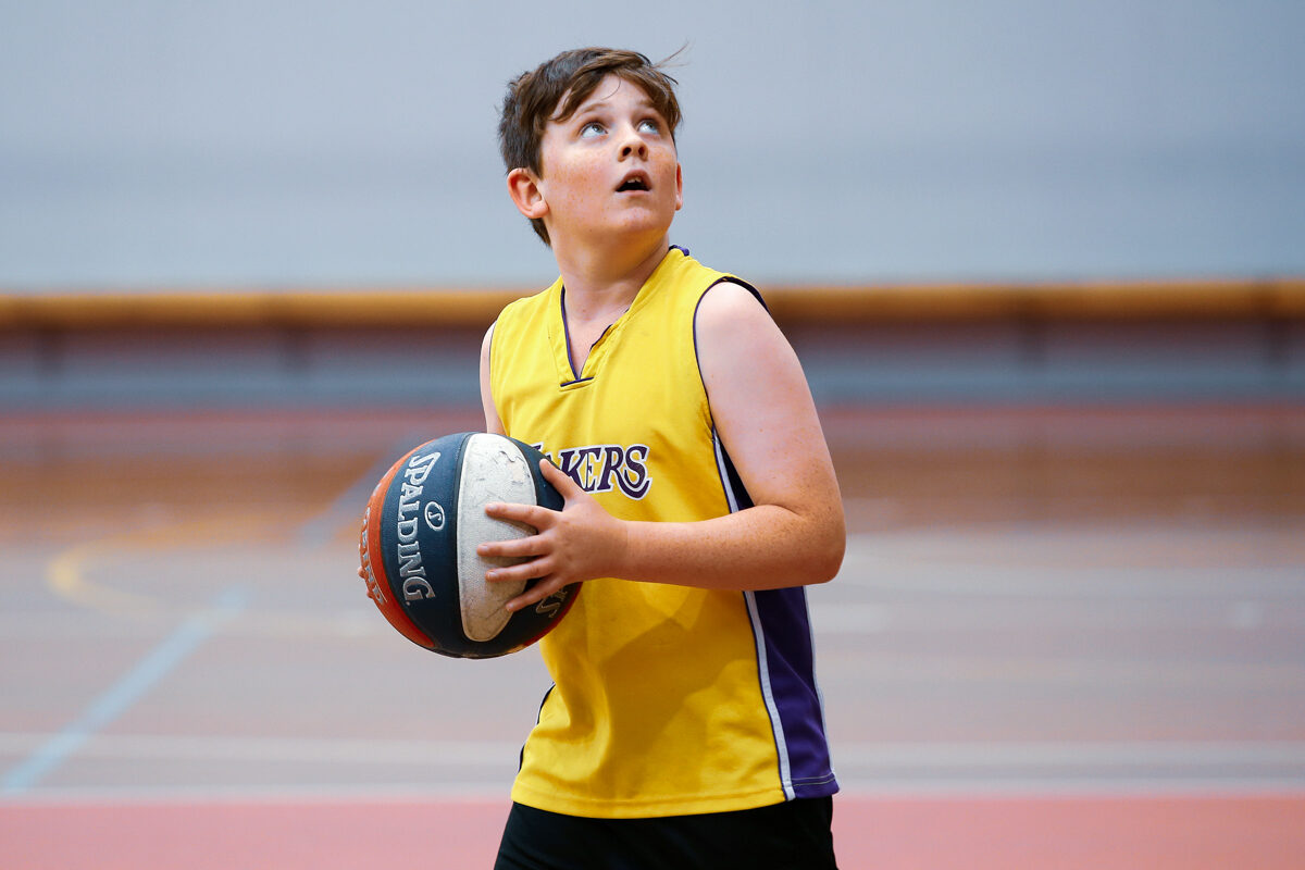 Eltham-stadium-boy-playing-basketball-1-e1710477637487.jpg