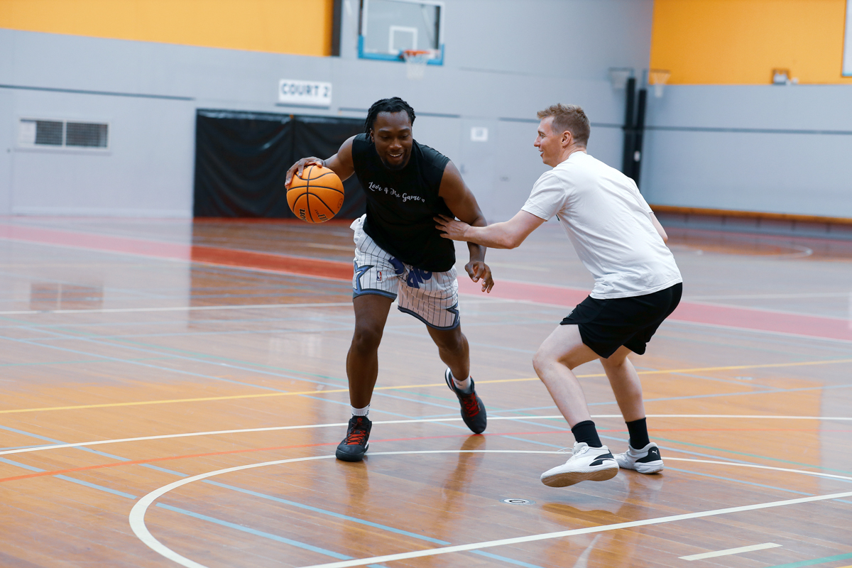 Eltham-stadium-two-males-playing-basketball.jpg